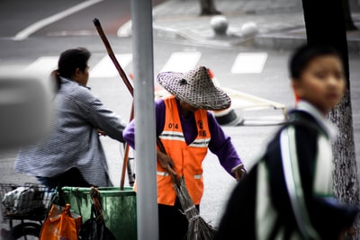 Men wearing orange reflective vest
